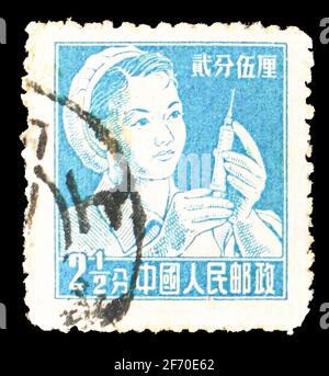 MOSKAU, RUSSLAND - 7. DEZEMBER 2020: Die in China gedruckte Briefmarke zeigt Labourant, Definitives Serie, um 1956 Stockfoto