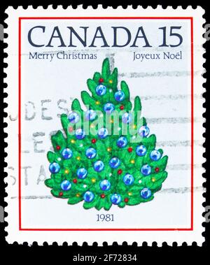 MOSKAU, RUSSLAND - 28. FEBRUAR 2021: Die in Kanada gedruckte Briefmarke zeigt den Weihnachtsbaum, 1981, um 1981 Stockfoto