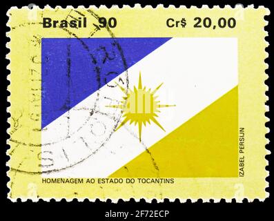 MOSKAU, RUSSLAND - 20. JANUAR 2021: In Brasilien gedruckte Briefmarke zeigt Flaggen der brasilianischen Staaten - Tocantins, Serie, um 1990 Stockfoto