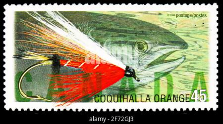 MOSKAU, RUSSLAND - 22. DEZEMBER 2020: Die in Kanada gedruckte Briefmarke zeigt Coquihalla Orange, Fishing Flies Serie, um 1998 Stockfoto