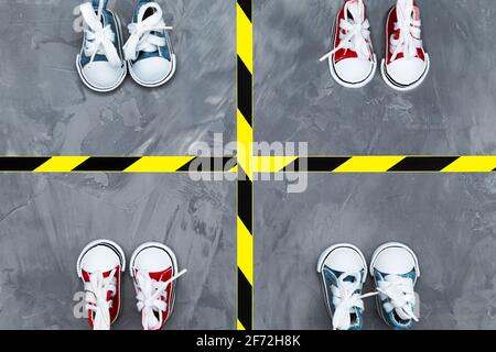 Konzept der sozialen Distanzierung. Turnschuhe und Warnband auf dem Asphalt-Hintergrund. Speicherplatz kopieren. Halten Sie Abstand, um die Ausbreitung des Virus zu verhindern. Neu Stockfoto