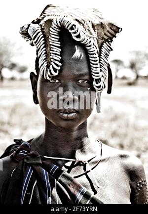 Mursi Frau ohne labialen Platte, ethnischen Minderheiten der unteren Omo Valley - Äthiopien. © Antonio Ciufo Stockfoto