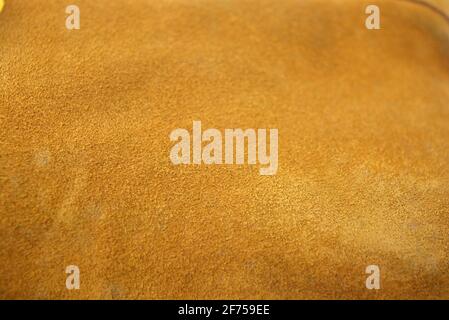 Brauner Hintergrund aus echtem Leder, natürliches Wildleder. Stockfoto