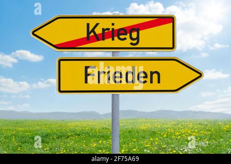 Zwei Richtungszeichen - Krieg oder Frieden - Krieg oder Frieden (deutsch) Stockfoto