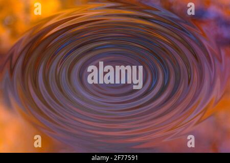 Spiralmuster in Violett, Blau und Orange. Als Hintergrund verwendbar Stockfoto