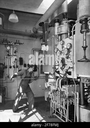 Hydraulische Pressenmaschine zur Herstellung von Kohlenstoffsäureschnee (Torris) in Stockholms Kohlenstoffausbeute-Fabrik. Stockfoto