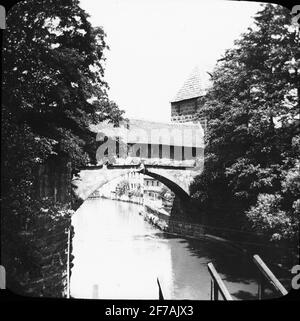 SkiopT-Ikone mit Motiven von Fleischerbrüge, Nürnberg. Das Bild wurde in Karton mit der Aufschrift The Journey 1910 gespeichert. Nürnberg 10. XVIII Stockfoto