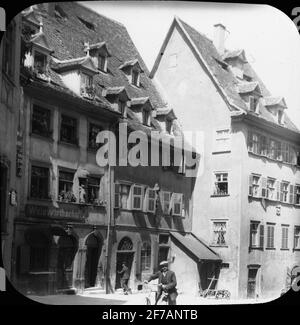 SkiopT Ikonbild mit Motiven von Mann mit Fahrrad auf der Straße in Bamberg.das Bild wurde in Karton mit der Aufschrift :? Stockfoto