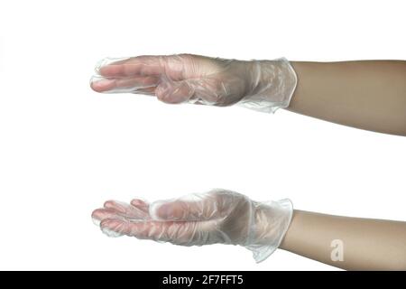 Weibliche Hände in Einweghandschuhen halten etwas, isoliert auf weißem Hintergrund Stockfoto