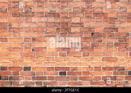 Mehrfarbige Backsteinwand Hintergrund Vielzahl von Ziegeln Backsteinwand gemacht Mit alten wiedergewonnenen Ziegeln in einem regelmäßigen Muster Stockfoto