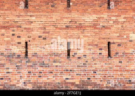Mehrfarbige Backsteinwand Hintergrund Vielzahl von Ziegeln Backsteinwand gemacht Mit alten wiedergewonnenen Ziegeln in einem regelmäßigen Muster Stockfoto