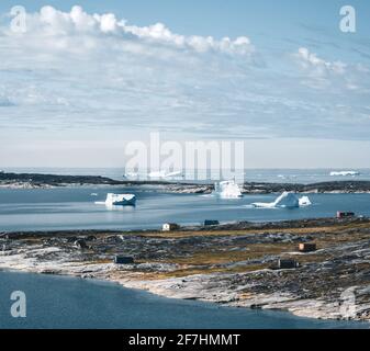 Das bunte Haus der Rodebay Ilulissat, Grönland. Diese Siedlung liegt auf einer kleinen Halbinsel ragt aus dem Festland in östliche Diskobucht entfernt Stockfoto