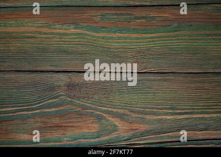 Alte Holzstruktur in Grün. Alte Holzplanken. Weicher Fokus Stockfoto