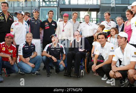 Monza, Italien - 09. September 2012: FIA Formel-1-Weltmeisterschaft im Autodromo Nazionale di Monza mit Geburtstagsfeier des HRT F1-Teamfahrers Pedro de la Rosa. Frank Williams, Niki Lauda, Norbert Haug, Bruno Senna, Daniel Ricciardo, Alexander Wurz, J, weltweit im Einsatz Stockfoto