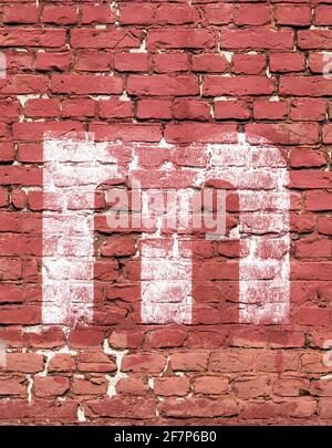 Der Buchstabe m malte weiß auf einer roten Ziegelwand Stockfoto