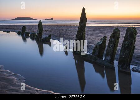 Wrack von Helvetia bei Sonnenuntergang Rhossili Bay, keine Menschen. Gower Peninsula, Südwales, Großbritannien Stockfoto