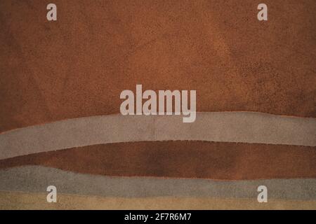 Lederteile Sortiment background.brown Echtleder Oberfläche. Materialien für die Herstellung von Accessoires, Schuhe und Kleidung aus echtem Leder Stockfoto