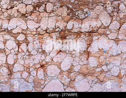 Alte strukturierte Oberfläche aus rotem Verona Marmor, Venedig, Italien Stockfoto