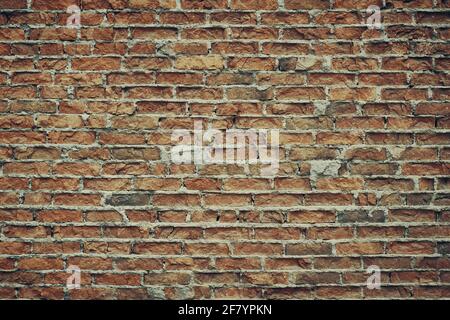 Alte Retro verwitterte Backsteinmauer Hintergrund Stockfoto