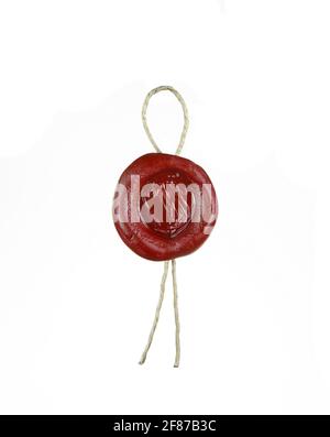 Siegel aus rotem Wachs mit einem Seil isoliert auf weiss Stockfoto