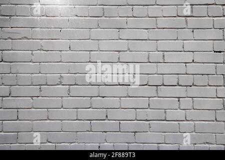 Industrieller Hintergrund, leeres Grunge städtische Lagerhalle Ziegelmauer. Urban gemalte Backstein Hintergrund Stockfoto