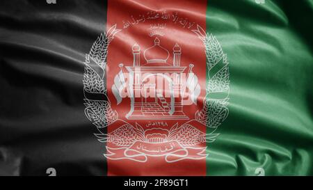 Afghanische Flagge winkt im Wind. Nahaufnahme eines Afghanistan-Banners, weiche und glatte Seide. Stoff Stoff Textur Fähnrich Hintergrund. Verwenden Sie es für die Natio Stockfoto