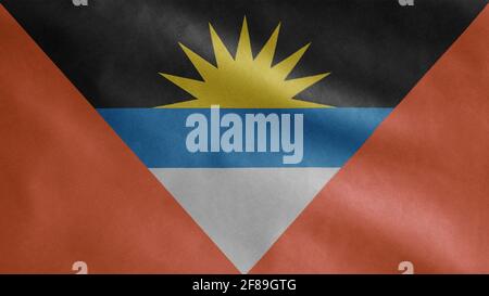 Die Flagge von Antiguan und Barbudan winkt im Wind. Nahaufnahme von Antigua und Barbuda Banner weht, weiche und glatte Seide. Stockfoto