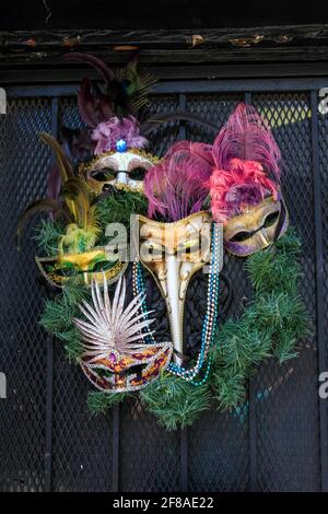 Mardi Gras maskiert auf Kranz in New Orleans Stockfoto