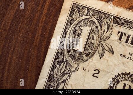 Ein altes schäbiges Notizbuch in einem amerikanischen Dollar. Hochwertige Fotos Stockfoto