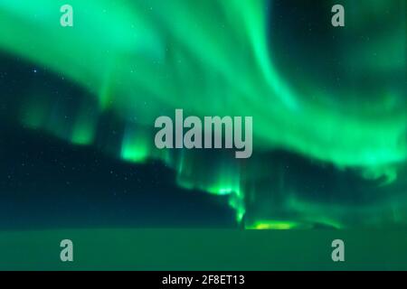Aurora-Display aus einem Flugzeug Stockfoto