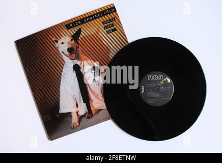 Pop-Rock-Künstler, Rick Springfield Musikalbum auf Vinyl-LP-Disc. Titel: Album-Cover von Working Class Dog Stockfoto