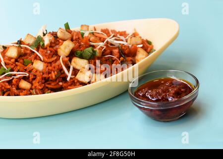 Schezwan paneer gebratener Reis mit schezwan-Sauce, chinesischer gebratener Reis mit Paneer, indochinesische Gerichte Stockfoto