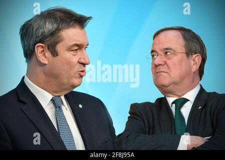 München, Deutschland. März 2021. FOTOMONTAGE: Machtkampf zwischen Markus SOEDER (Ministerpräsident Bayern und CSU-Vorsitzender) und Armin LASCHET um die Kanzlerkandidatur. Credit: dpa/Alamy Live News Stockfoto