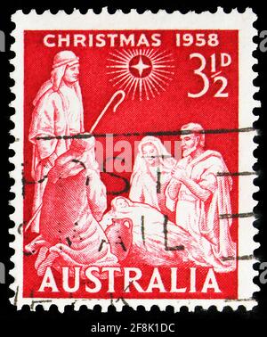 MOSKAU, RUSSLAND - 7. OKTOBER 2019: Die in Australien gedruckte Briefmarke zeigt die Anbetung Christi, Weihnachtsserie 1958, um 1958 Stockfoto