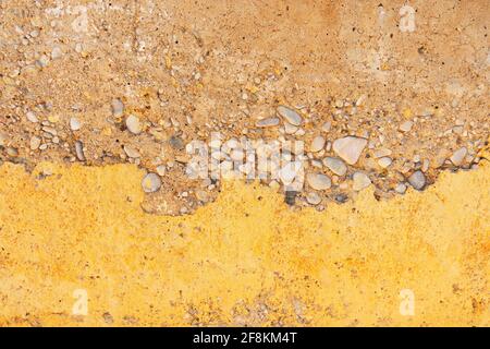 Alte gelbe Grunge rissig Wand Textur Hintergrund Stockfoto