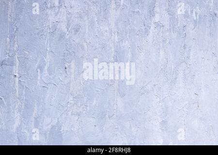 Grau gemalter Hintergrund mit einer rauen Textur Stockfoto