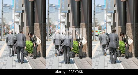 Triptychon japanischer Büroangestellter und -Frauen, die sich auf dem Bürgersteig gegenseitig verneigen (ojigi), Ginza, Tokio, Japan Stockfoto