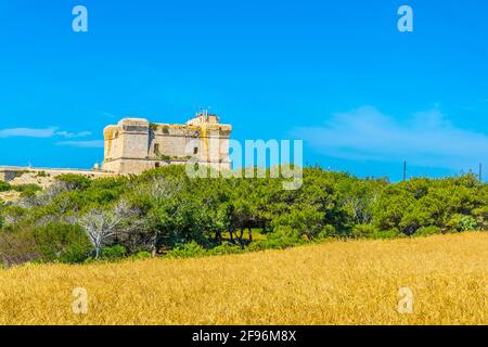 Der Turm des heiligen Lucian in der Nähe von Marsaxlokk auf Malta Stockfoto