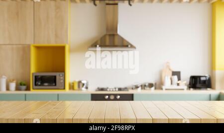 Leerer Holztisch und verschwommener Küche mit gelbem Hintergrund/Holztisch Top auf Unschärfe Küchentisch.3D-Rendering Stockfoto