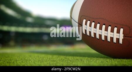 American Football Ball auf Gras der Fußball-Arena, 3d-Illustration Stockfoto