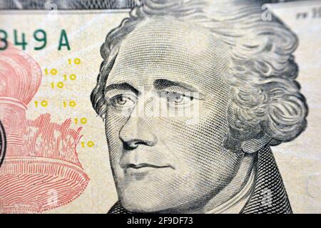 Alexander Hamilton Portrait auf der Banknote von 10 Dollar, Hintergrund von 10 US-Dollar, selektiver Fokus, us-Dollar-Banknote Stockfoto