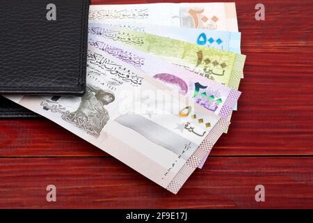 Syrisches Geld - Pfund in der schwarzen Brieftasche Stockfoto