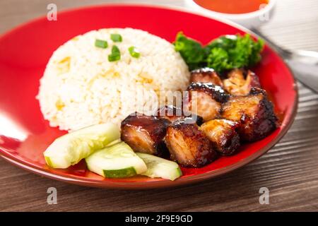 Chinese Sweet BBQ Schweinefleisch wird in einer süßen BBQ-Sauce mariniert und dann geröstet. Stockfoto