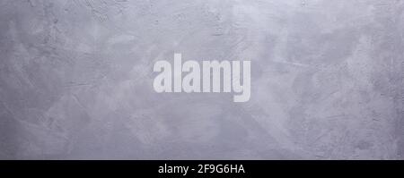 Graue Stein- oder Marmoroberfläche Hintergrund des Tisches, graue Wand- oder Bodenstruktur. Panorama- oder Panoramaansicht mit Kopierbereich Stockfoto