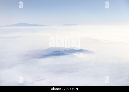 Sierra Nevada Berge über Wolken, Spanien Stockfoto