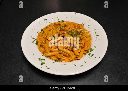 Köstliches italienisches Gericht, bekannt als Penne Alla Vodka Stockfoto