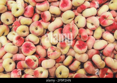 Saturn Pfirsiche. Bunte Frucht Hintergrund, Pan tao Stockfoto