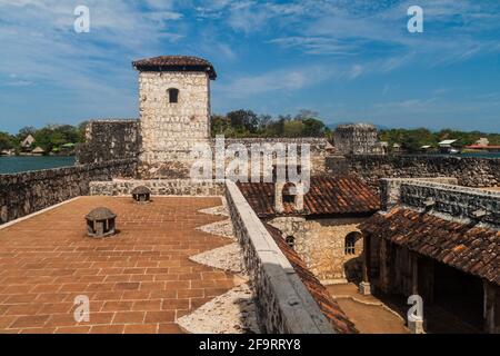 Castillo de San Roam, spanische Kolonialfestung am Eingang zum Izabal-See im Osten Guatemalas. Stockfoto