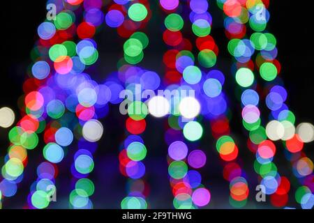 Magischer Hintergrund mit buntem Bokeh. Stockfoto