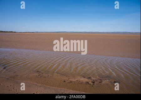 Sandstrand bei Ebbe, Port Carlisle, Cumbria, England Stockfoto